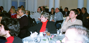 Banquet guests listening to Jerry Marsden roast the celebrants.